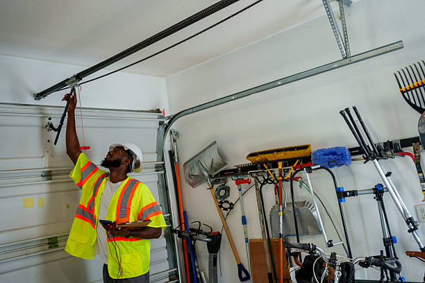 Professional Garage Door Panel Replacement technician working in Farmers Loop, AK